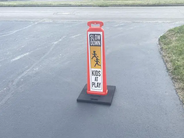 Alt view image 2 of 4 - SLOW DOWN KIDS AT PLAY Vertical Panel Sign Kit, Double-sided, Reflective sheeting. Vertical Panel & 20lb Base (Sign and base ship separately)