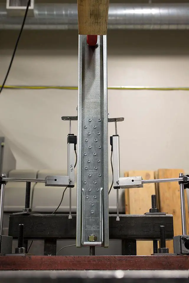 Alt view image 4 of 6 - HTT5 HTT Heavy Tension Tie - 16-in., for 5/8-in. Anchor, 11-Gauge Zinc-Galvanized Steel Build, Four-Ply Formed Seat to Reduce Deflection (Pack of 10)