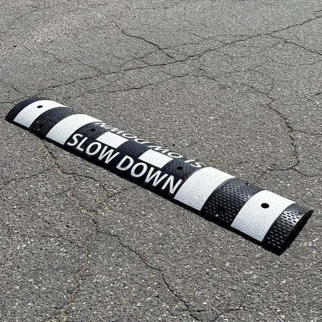 Alt view image 2 of 5 - 6' Speed Bump - Slow Down Speed Bumps for Asphalt - Black Speed Humps - 6 Foot Portable Speed Bump - Speed Bumps for Road and Driveway (6' Speed Bump - White)