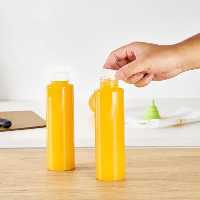 Alt view image 5 of 6 - 16 Ounce Juice Bottles, 100 Disposable Clear Bottle With Caps - White Plastic Caps Included, Round, Clear Plastic Bottles For Juicing, Perfect For Juice Shops, Cafes And More