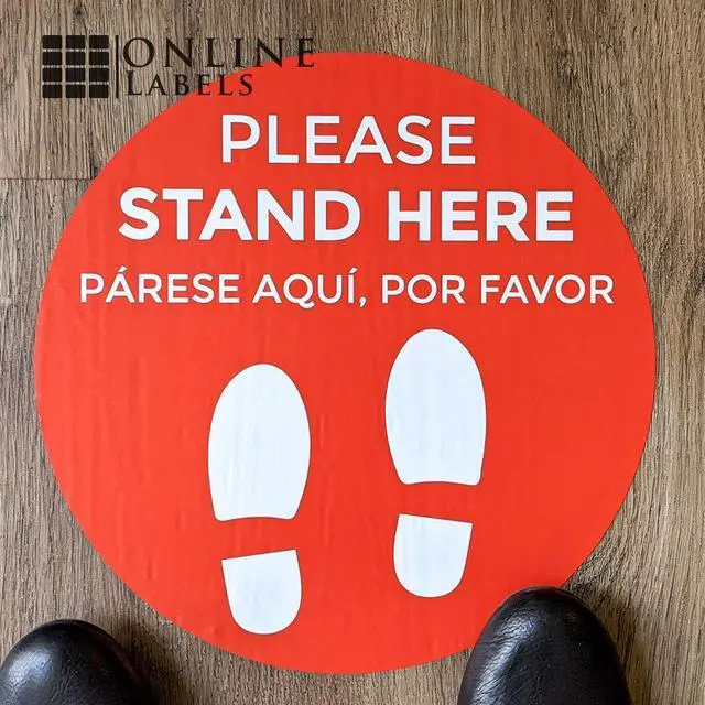 Alt view image 2 of 6 - Social Distancing Floor Signs in English & Spanish - Pack of 25 Stickers - Red Stand Here Design - 12 Inch Circle - Indoor Only - Removable Adhesive Vinyl
