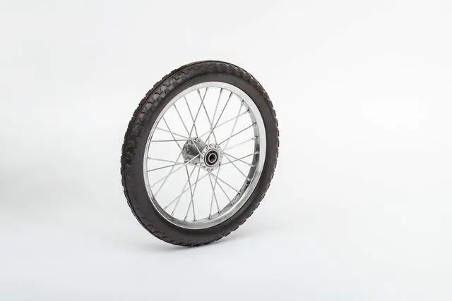 Alt view image 3 of 6 - 26" Flat Free Wheel | Wire Spoke Replacement Wheel | Silver Spoke Tire with Turf-Style Tread | 5/8" Bearings | 2.75" Hub