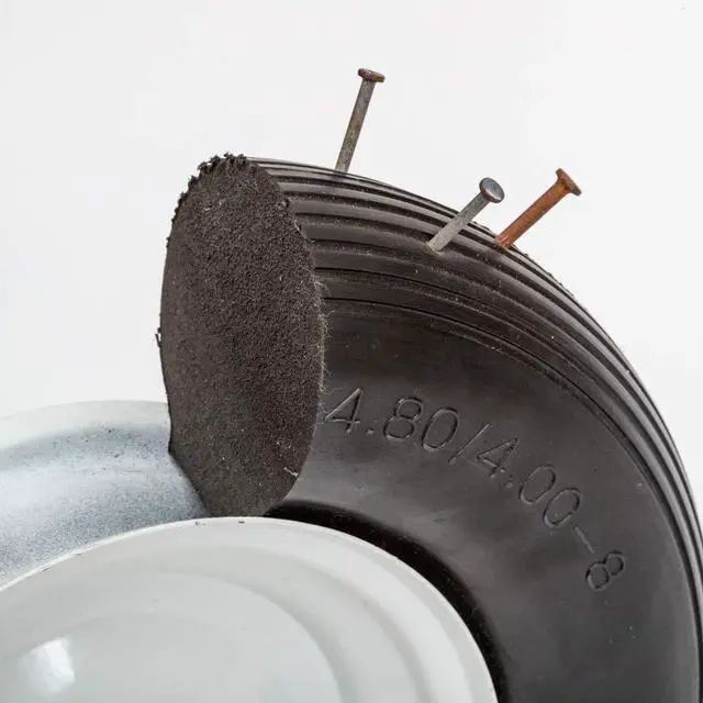 Alt view image 2 of 4 - Flat Free Universal Wheelbarrow Replacement Tire | Complete Wheel Assembly | White Rim and Ribbed Tread | 16" Wheel | Adapter Kit Included
