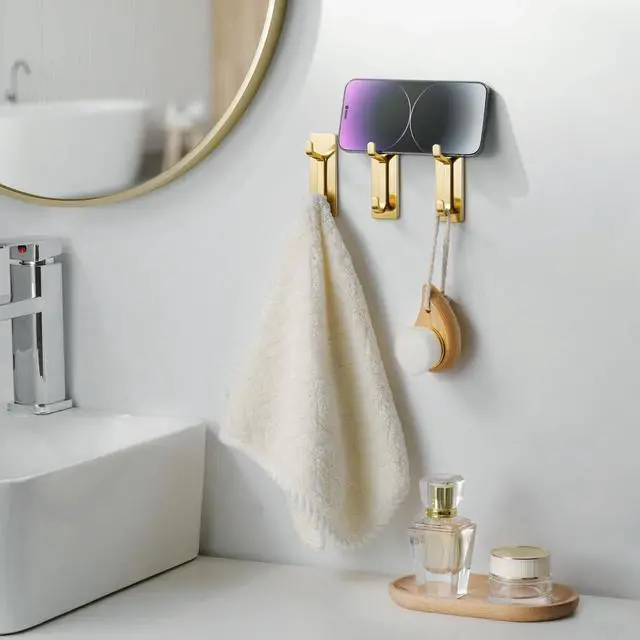 Alt view image 4 of 6 - Self Adhesive Wall Hooks for Hanging: Extra Strong 13 LB, Hook for Coat, Towel in Bathrooms, Shower, Kitchen, Wall, Door Hook, Brushed Gold 4 Pack