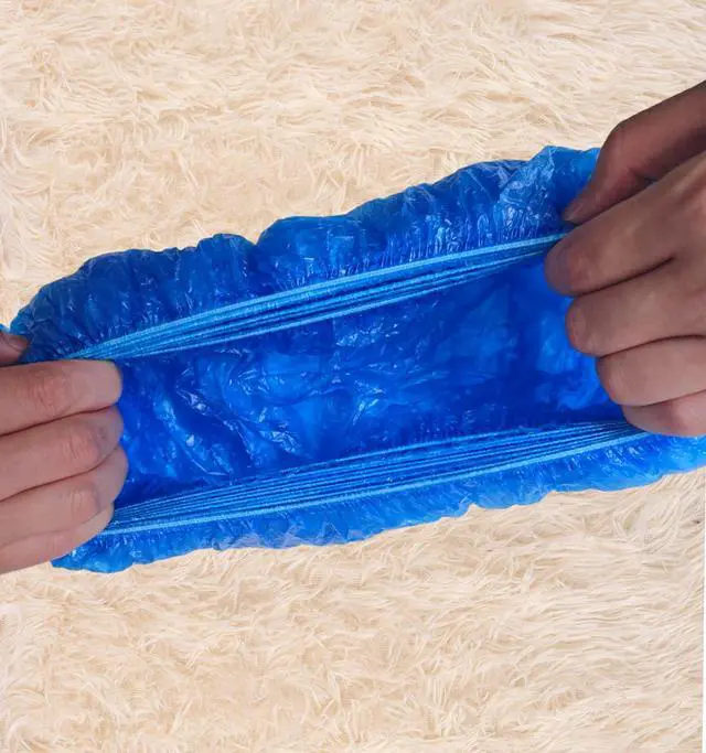 Alt view image 5 of 6 - 100pcs Shoe Cover Machine Refill Disposable Shoe Cover Dispenser Refill with T-shaped Buckles.