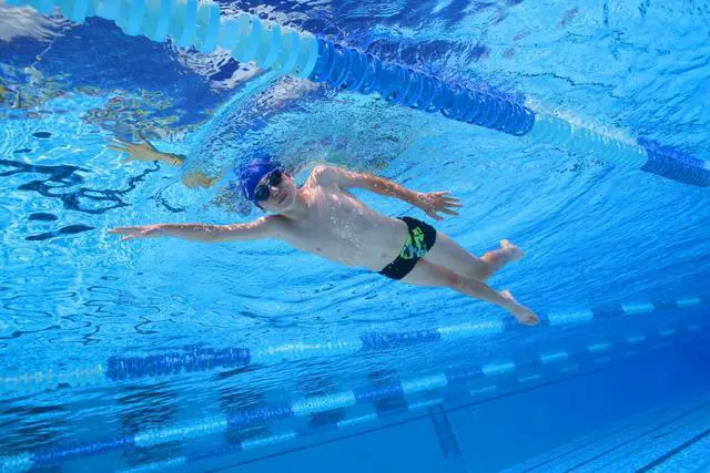 Alt view image 5 of 6 - Tracks Unisex Junior Youth Essential Racing Swim Goggles Kids Swimmers Young Racers Anti-Fog Coated Non-Mirror Lens, Blue/White/Fluo Yellow