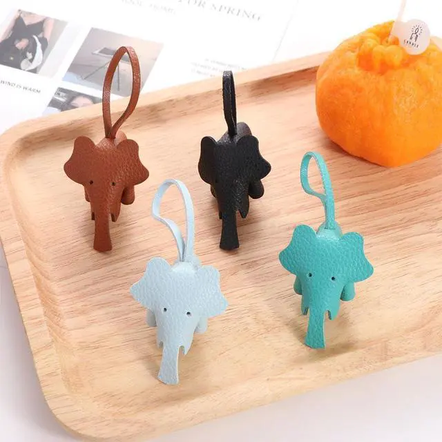 Alt view image 3 of 7 - 4 Pcs Cute Elephant Keychain Handmade PU Leather Keychains Bag Pendant Charm Phone Straps Car Key Accessories for Women Girls