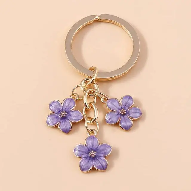 Alt view image 2 of 4 - Flower Charms Daisy Enameled Keychain Chain Tassel Keyring For Women Girls Gifts Purse Bag Accessories-C Purple