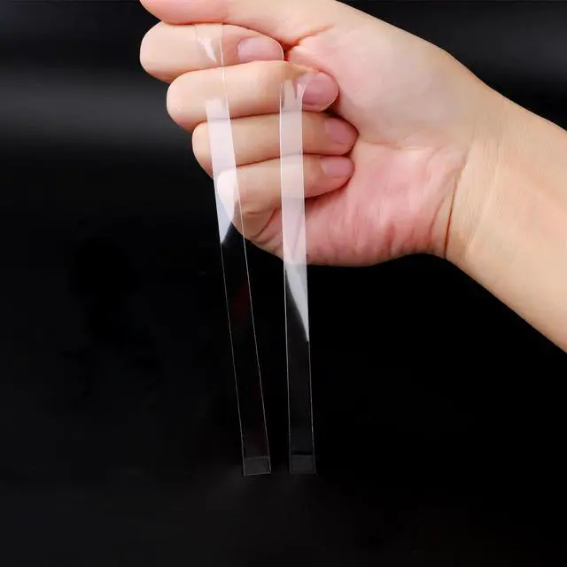 Alt view image 4 of 5 - Strong Double Sided Mounting Tape, Heavy Duty Adhesive Tape, Clear Removable Tape for Home, Office, DIY - Multipurpose, Strong Hold, Damage-Free Wall Hanging Strips(0.4in, 10ft)