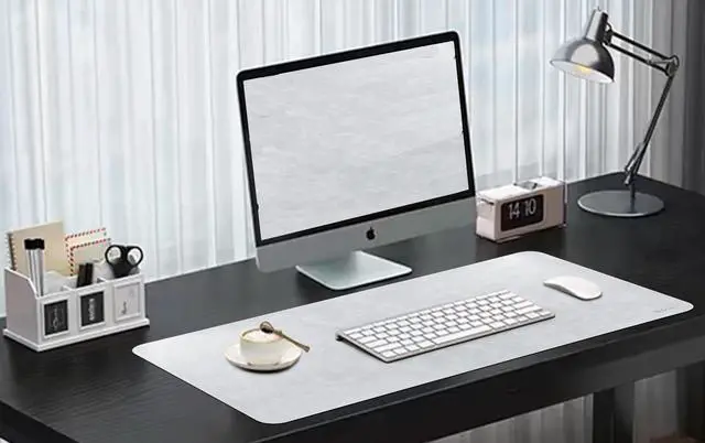 Alt view image 2 of 7 - Soft Anti-Curl Faux PU Desk Mat 31.5"x15.7", Waterproof Heat Safe Non-Slip Vintage Desk Pad, Stitched Edge Wipeable Tear Resistant Desktop Protector for Work from Home Office (Light Grey)