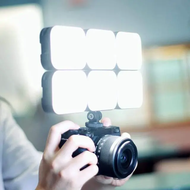 Alt view image 4 of 7 - VL100C Bi-Color LED Video Light on Camera Adjustable Angle Dimmable