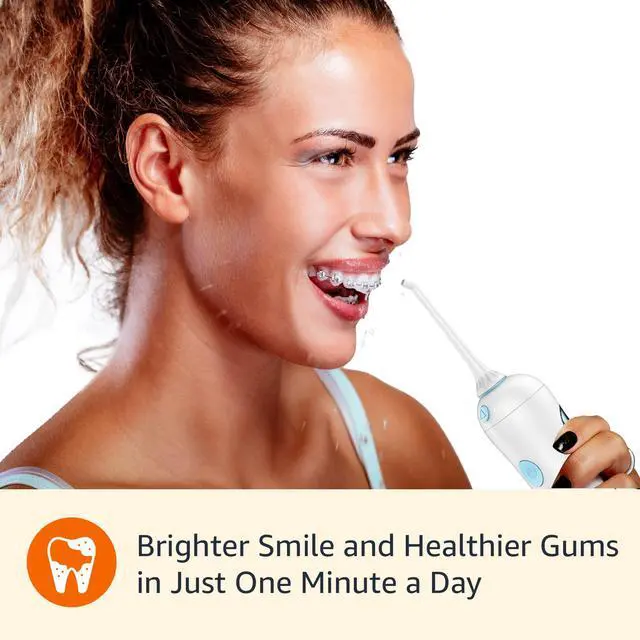 Alt view image 5 of 7 - HydroClean Portable Cordless Water Flosser for Teeth and Gums, 2 Pressure Tips, Removable Tank, 30 Seconds Water Capacity, 2 AA Batteries Included