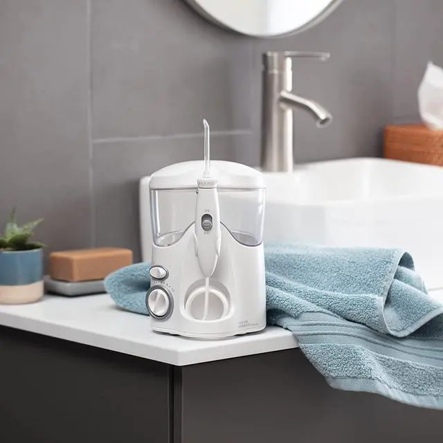 Alt view image 5 of 7 - Ultra Water Flosser, White - 90+ Seconds of Flossing Time - 10 Pressure Settings, 360-Degree Tip Rotation - Includes Six Tips & Built-in Tip Storage