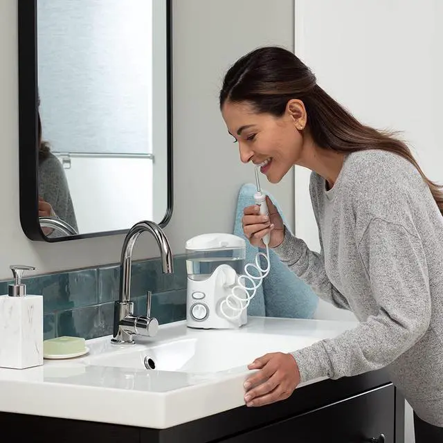 Alt view image 3 of 7 - Ultra Water Flosser, White - 90+ Seconds of Flossing Time - 10 Pressure Settings, 360-Degree Tip Rotation - Includes Six Tips & Built-in Tip Storage