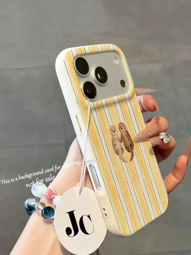 Alt view image 2 of 7 - Bks 1pc Full Coverage Lychee Texture Cute Holding Hands Otter Baby Light Yellow Striped Fashion Phone Case, Ins Healing Style Solid Color Phone Case, Perfect For Summer Use, Compatible With IPhone16/1