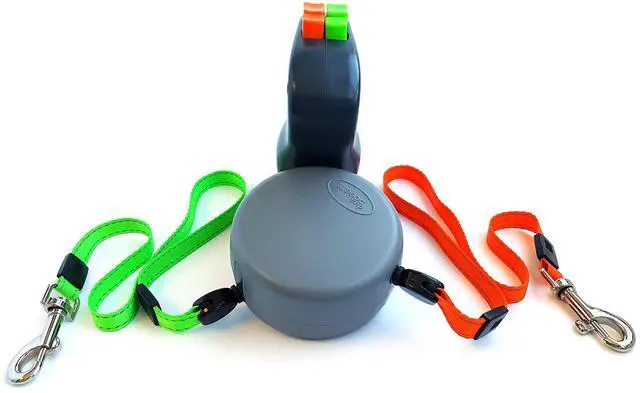 Alt view image 3 of 4 - Two Dog Reflective Retractable Pet Leash 360 Degree Zero Tangle Patent - Two Dogs Each up to 50 lbs and 10ft. Reflective Orange and Green Leads. Dual locking