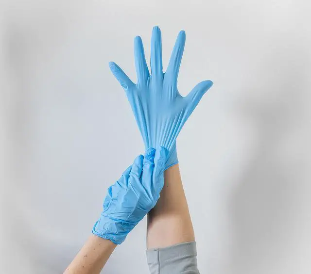 Alt view image 2 of 3 - Nitrile Disposable Gloves, Non-Sterile, One Size Fits Most, Tear & Puncture Resistant, 9.5-Inch Length with Beaded Cuff, 80 Count, Blue