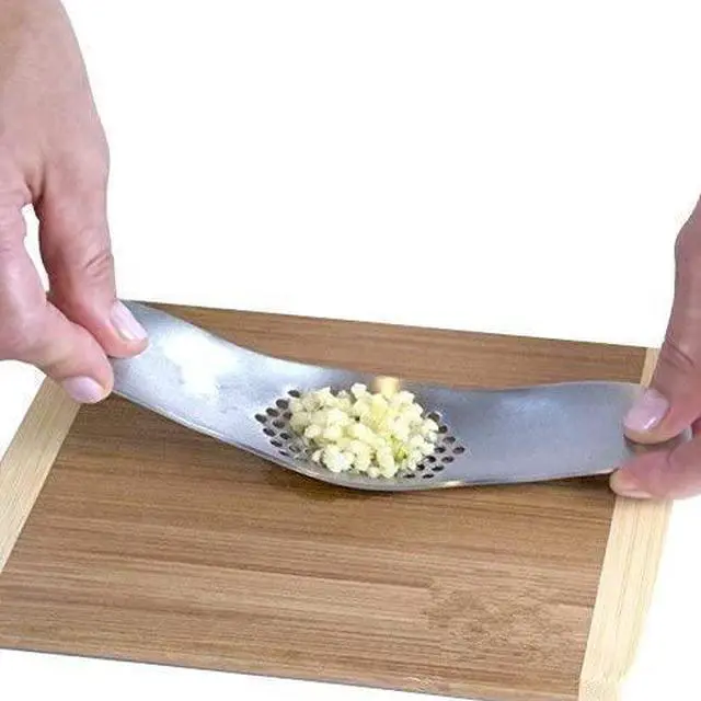 Alt view image 2 of 7 - Garlic Press Stainless Steel Garlic Rocker with Silicone Peeler