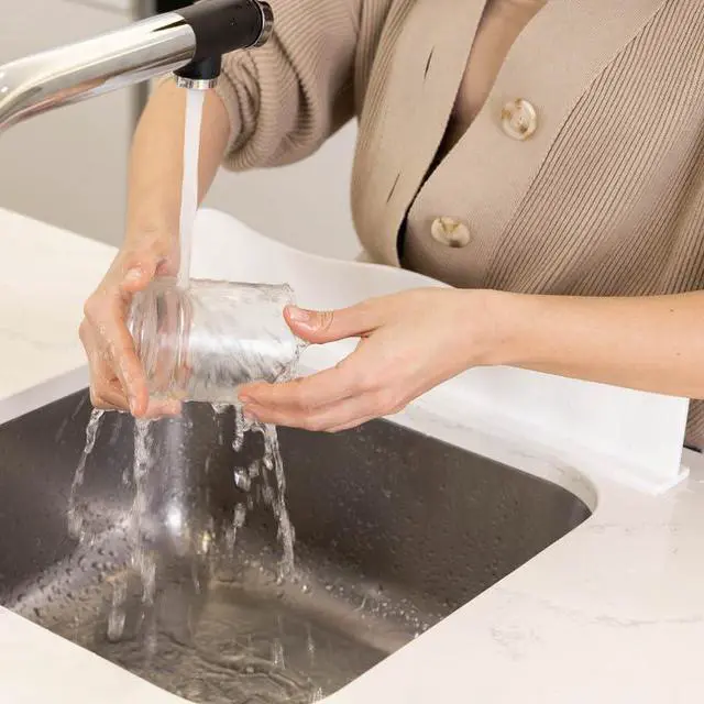 Alt view image 4 of 6 - Silicone Sink Splash Guard - Water Splash Guard for Kitchen, Island and Bathroom - Secure Non-Slip Suction Cup Base - Dishwasher Safe, White (17.4 x 1.7 x 3.6")