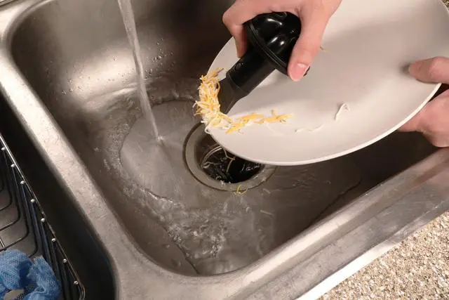 Alt view image 6 of 7 - 10768A | Disposal Genie II Garbage Disposal Strainer and Stopper, Kitchen Sink Drain Splash Guard with Food Scraper, Black, 1-Pack