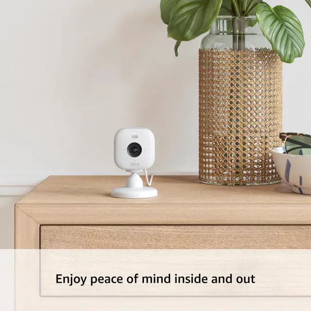 Alt view image 2 of 5 - Blink Mini 2 + Weather Resistant Adapter Indoor/Outdoor Home Security & Pet Camera(s) with HD video, motion detection, and built-in spotlight 1 camera (White)