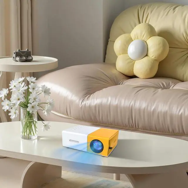 Alt view image 3 of 5 - Mini Projector, Portable Movie Projector, Compact Home Theater System, CE & FCC Certified, Multi-Interface, Yellow & White, 5 x 3.4 x 1.9 in / 12.6 x 8.58 x 4.77 cm, With Remote Control