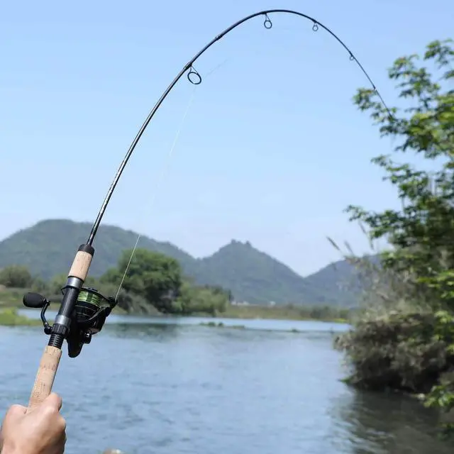 Alt view image 6 of 7 - Fishing Rods Graphite Lightweight Ultra Light Trout Rods 2 Pieces Cork Handle Crappie Spinning Fishing Rod