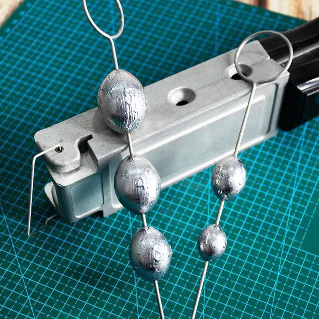 Alt view image 6 of 7 - Egg Sinker Mold Fishing Weight Molds with 5 Mold Cavities,1oz, 2oz, 3oz, 4oz, 5oz, Lead Sinker Molds with 2 Pull Pin
