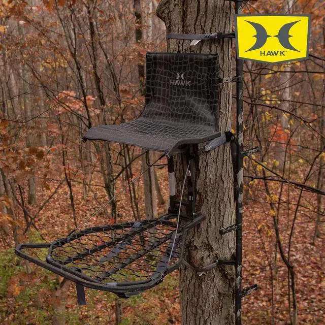 Alt view image 4 of 7 - Kickback Lvl Hang on Tree Stand HWK HF2031, 24x30 Platform | 24x30 in Welded Platform, Xl Mesh Seat 21x15 in, Steel Construction, 300 Lb Capacity, Kickback Footrest