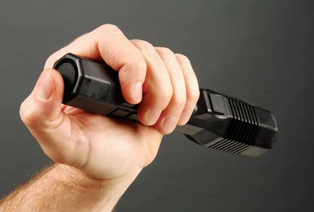 Alt view image 4 of 5 - 7060 Rechargeable Tactical Flashlight With Charger (Black)