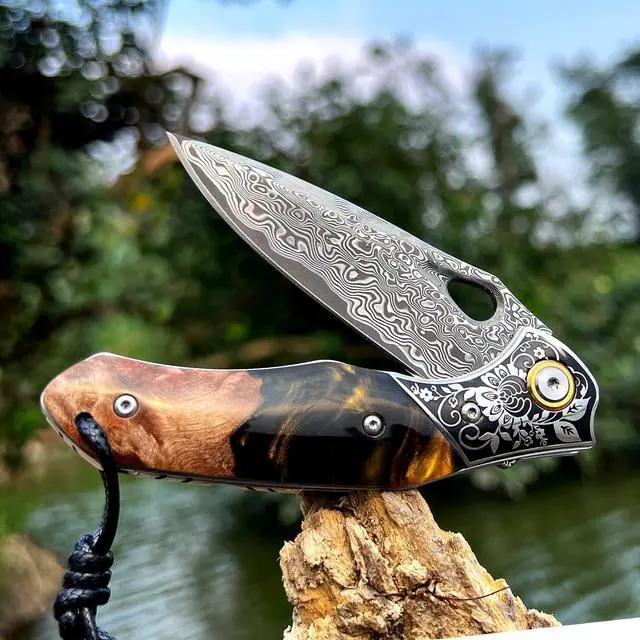 Alt view image 5 of 7 - handmade Japan Damascus steel pocket knife3.1" VG10 blade men and women Folding knifeWith holsterLining lockresin and Maple handleSuitable for EDC outdoor campinggo fishing hunting