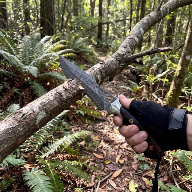 Alt view image 6 of 7 - Damascus Hunting Knife 10.4" Fixed Blade VG10 Leather Sheath | 107-layer hand-forged bowie construction with ergonomic rosewood handle for outdoor camping and survival