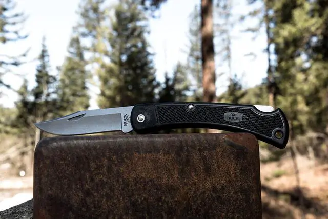 Alt view image 2 of 7 - 110 Folding Hunter LT Knife, 3-3/4" Blade, Lockback Design, Nylon Handle, 420HC Stainless Steel Clip Point Blade, Sheath Included, Hunting Knife Made in the USA, 3.2 oz