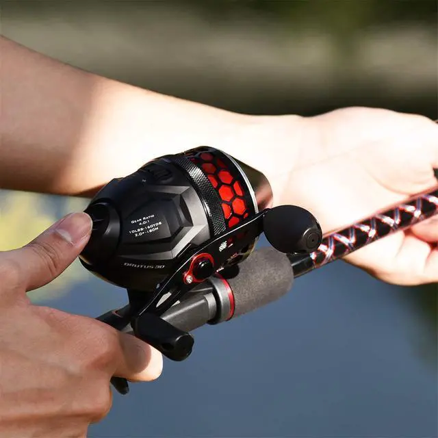 Alt view image 6 of 7 - Brutus Spincast Fishing Reel,Easy to Use Push Button Casting Design,High Speed 4.0:1 Gear Ratio,5 MaxiDur Ball Bearings, Reversible Handle for Left/Right Retrieve, Includes Monofilament Line