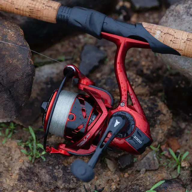 Alt view image 5 of 7 - Royale Legend Fishing Reel - 5.2:1/6.2:1 Gear Ratio Spinning Reel, Up to 22 Lbs of Carbon Drag, 5+1/7+1 Stainless Steel Ball Bearings, Graphite Frame, Asymmetric Spinning Reel Rotor Design
