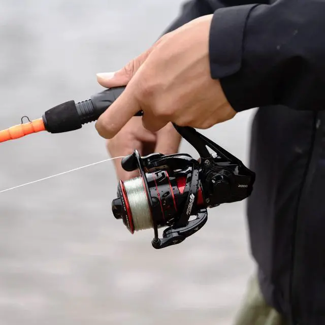 Alt view image 5 of 7 - Royale Legend Fishing Reel - 5.2:1/6.2:1 Gear Ratio Spinning Reel, Up to 22 Lbs of Carbon Drag, 5+1/7+1 Stainless Steel Ball Bearings, Graphite Frame, Asymmetric Spinning Reel Rotor Design