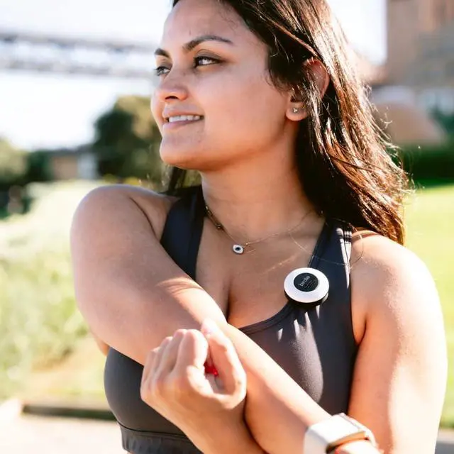 Alt view image 6 of 7 - The Original Personal Safety Alarm Disc for Bikes, Hikes, and Late Nights - Loud Siren, LED Light for Extra Visibility, Rechargeable, Handsfree, Lightweight, Water Resistant (Blossom)