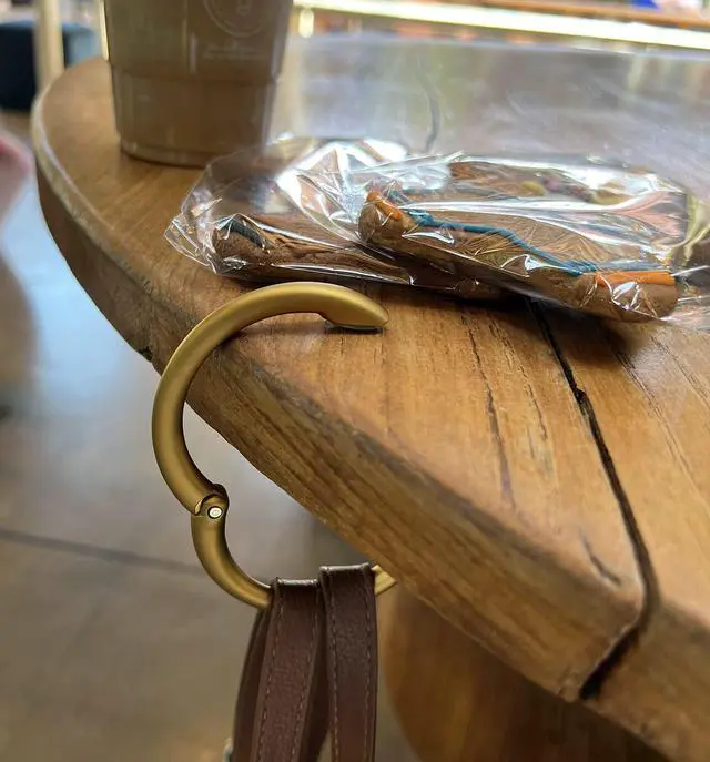 Alt view image 7 of 7 - Bag Hanger, Matte Gold PVD | The Ring that Opens into a Handbag Hook