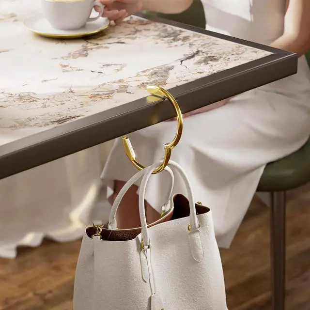Alt view image 4 of 7 - Purse Hook for Table - Upgraded Snap-On Closure Design Bag Hanger - Heavy Duty Handbag Holder Holds 33 lbs - Portable Desk Hook for Purses, Bags, Backpacks in Restaurant, Office, Car (Gold)