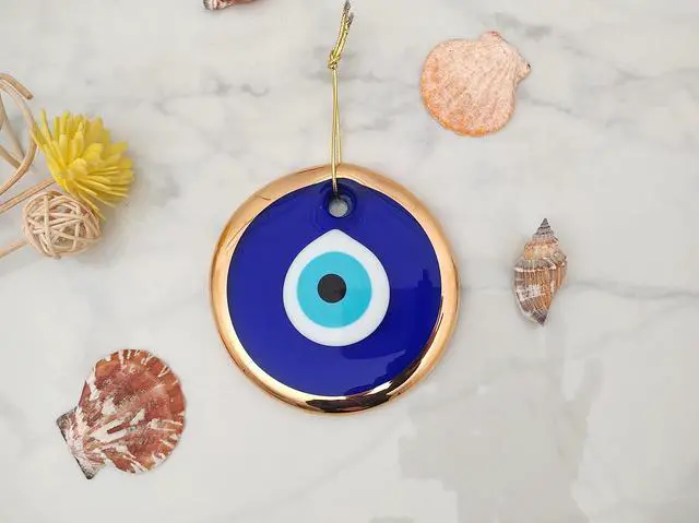 Alt view image 4 of 6 - 3.5" Glass Blue Evil Eye Wall Hanging Gold Ornament - Turkish Nazar Bead - Home Protection Charm - Gold Wall Decor Amulet in a Box (Medium)