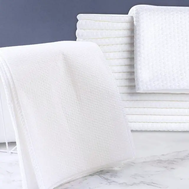 Alt view image 5 of 6 - Disposable Bath Towels, 25 Pack 55" x 27.5" Ultra-Soft and Quick Dry Bath Towel, Portable Salon Towels for Travel Sauna Spa Beach Gym
