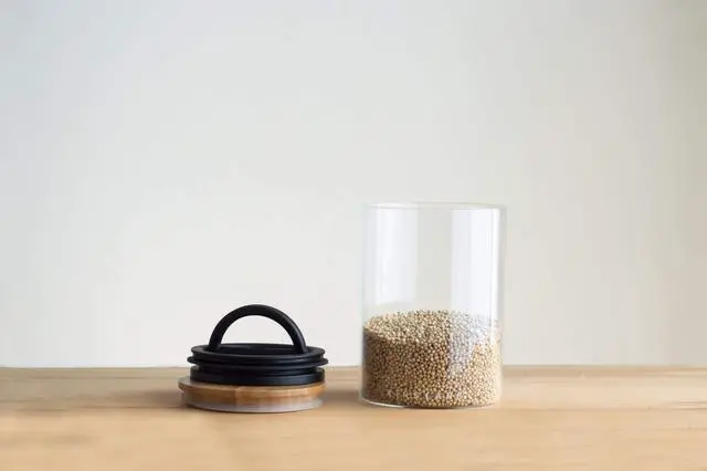 Alt view image 6 of 7 - Glass Food Storage Canister - Glass Storage With US Patented Airless Inner Lid & Bamboo Top Lid - Preserves Food Freshness (Medium 7-Inch)