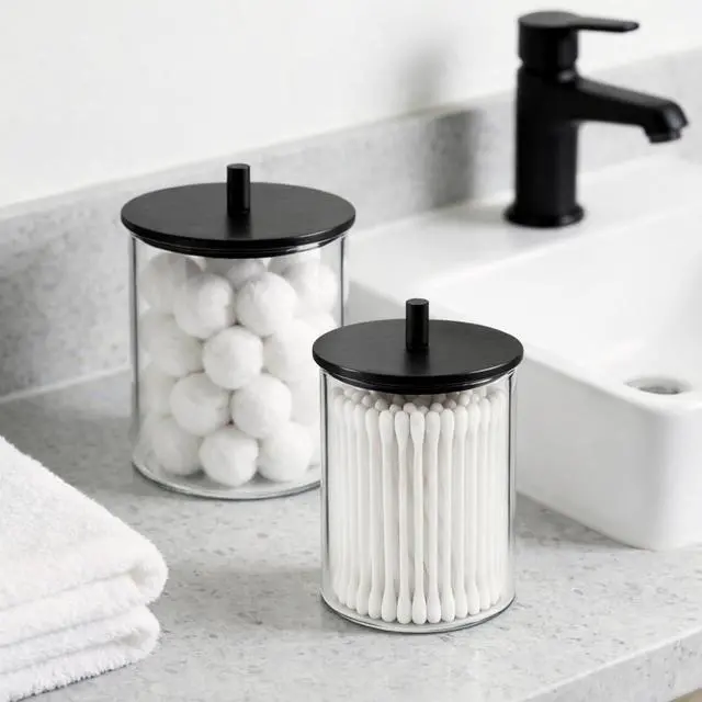 Alt view image 5 of 7 - Glass Qtip Holder Dispenser Set - 15oz & 10oz Cotton Swab Holder with Black Wooden Lids, Apothecary Jar Bathroom Storage Canisters for Cotton Balls, Floss Picks, Vanity Organizer Container (2 Pack)