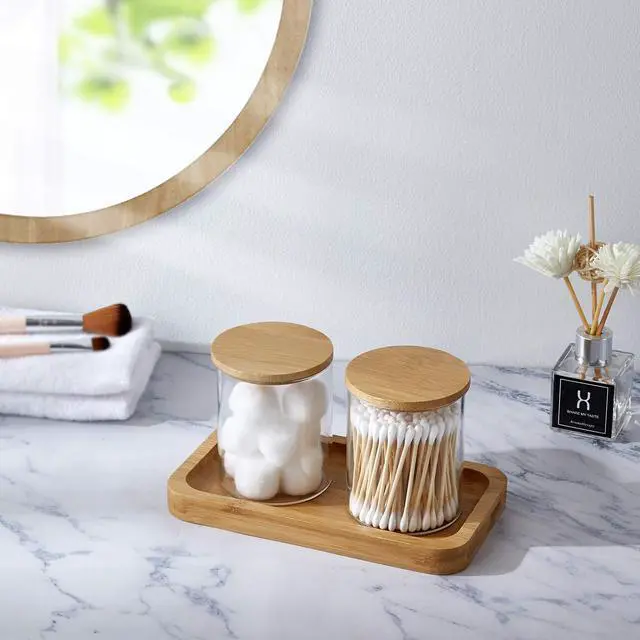 Alt view image 4 of 7 - Glass Qtip Holder with Vanity Tray, Apothecary Jars Bathroom Accessories Bathroom Canisters Organizer Countertop Q Tip Holder for Cotton Ball Round Swab Pad Hair Ties Floss Perfume Jewelry