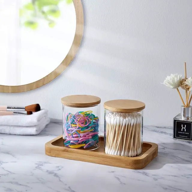 Alt view image 5 of 7 - Glass Qtip Holder with Vanity Tray, Apothecary Jars Bathroom Accessories Bathroom Canisters Organizer Countertop Q Tip Holder for Cotton Ball Round Swab Pad Hair Ties Floss Perfume Jewelry
