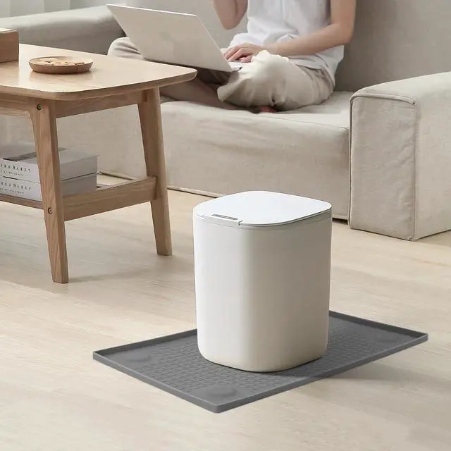 Alt view image 7 of 7 - Trash Can Mat, Silicone with Dual Non-Slip Texture, Bottom Suction Cups for Secure Placement on Smooth Surfaces, Raised Edges to prevent Spills,Suitable for Kitchen, Living Room, Bedroom