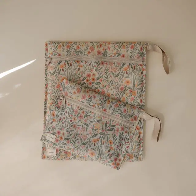Alt view image 3 of 7 - Water Resistant Wet Bags | Large & Small Reusable Storage Bag for Baby Items and Travel | Zippered Pockets with Handle | Machine Washable, Set of 2 (Pastel Blooms)