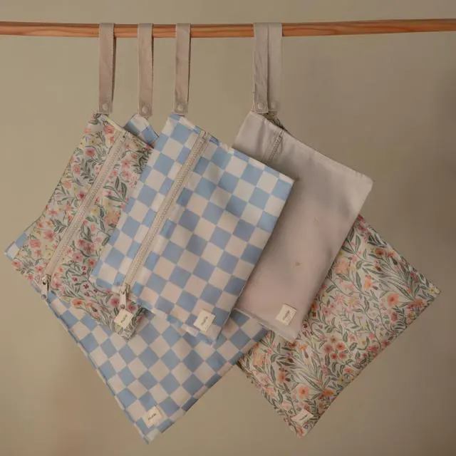 Alt view image 4 of 7 - Water Resistant Wet Bags | Large & Small Reusable Storage Bag for Baby Items and Travel | Zippered Pockets with Handle | Machine Washable, Set of 2 (Pastel Blooms)