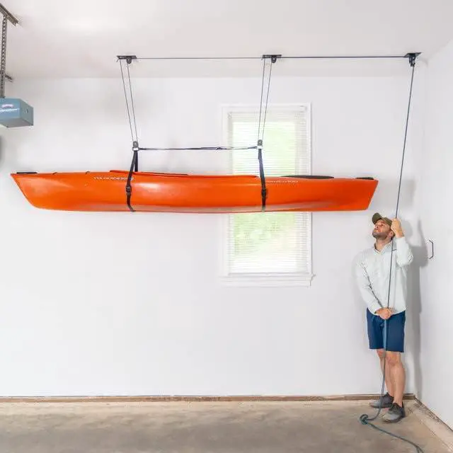 Alt view image 3 of 6 - Pulley Hoist for Kayaks, Canoes, and Paddleboards - Heavy Duty Garage Storage Lift - Kayak Hanger Holds 150 lbs and Fits 10-14 ft Tall Garage Ceilings