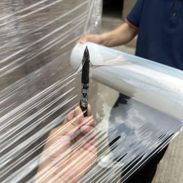 Alt view image 3 of 5 - 4-Pack Clear Stretch Wrap 18" x 1000 Feet 80 Gauge Industrial Strength with Plastic Handle, Plastic Pallet Supplies Durable Self-Adhering for Packing, Moving, Heavy Duty Shrink Film Rolls